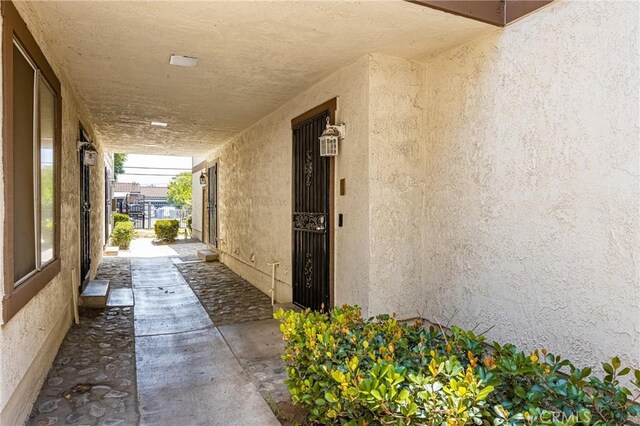 1206 S Cypress Ave Unit F, Ontario, CA 91762 - property entrance with stucco siding