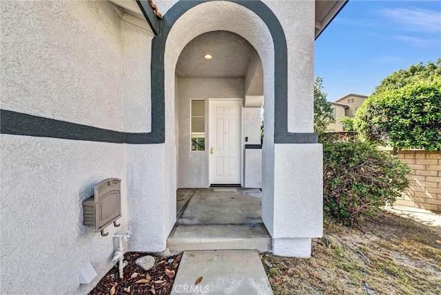 7522 Calais Ct, Rancho Cucamonga, CA 91730 - entrance to property featuring stucco siding