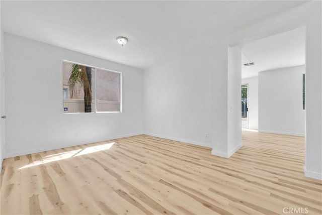 7522 Calais Ct, Rancho Cucamonga, CA 91730 - empty room featuring wood finished floors and baseboards