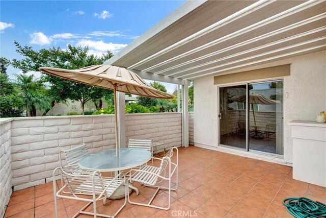 2160 Via Mariposa E Unit D, Laguna Woods, CA 92637 - view of patio with outdoor dining space