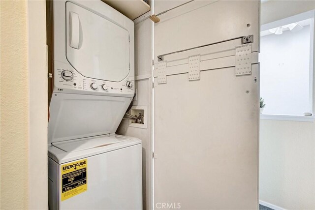 2160 Via Mariposa E Unit D, Laguna Woods, CA 92637 - laundry room with stacked washer / dryer