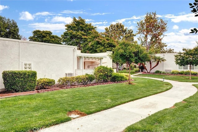 2160 Via Mariposa E Unit D, Laguna Woods, CA 92637 - view of home's community featuring a yard