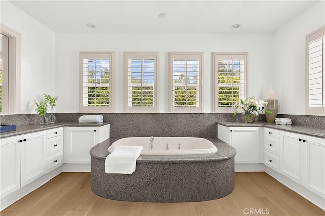 3 Seabluff, Newport Beach, CA 92660 - full bath with vanity, wood finished floors, and a bath