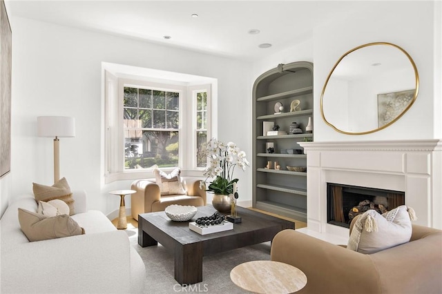 3 Seabluff, Newport Beach, CA 92660 - living area with built in features and a fireplace with raised hearth