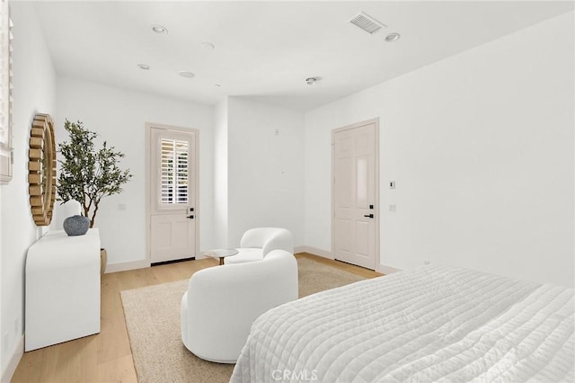 3 Seabluff, Newport Beach, CA 92660 - bedroom featuring light wood-style flooring and recessed lighting