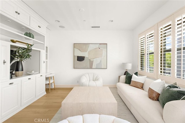 3 Seabluff, Newport Beach, CA 92660 - living area with light wood-style flooring and recessed lighting