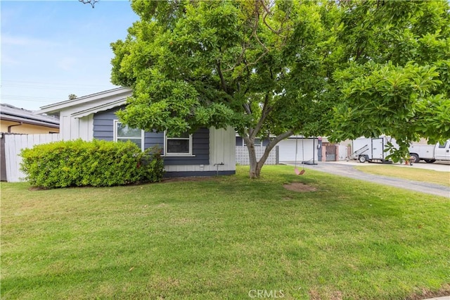 7417 Ponce Ave, West Hills, CA 91307 - view of property hidden behind natural elements featuring driveway and an attached garage