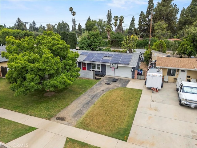 7417 Ponce Ave, West Hills, CA 91307 - view of front of home with driveway, roof mounted solar panels, and a shingled roof