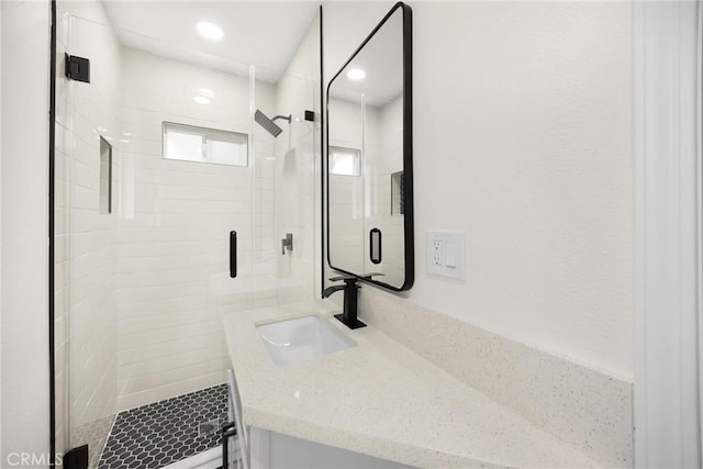 9737 Felipe Ave, Montclair, CA 91763 - full bath with a shower stall, vanity, and recessed lighting