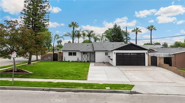 9737 Felipe Ave, Montclair, CA 91763 - ranch-style house with an attached garage, driveway, and stucco siding