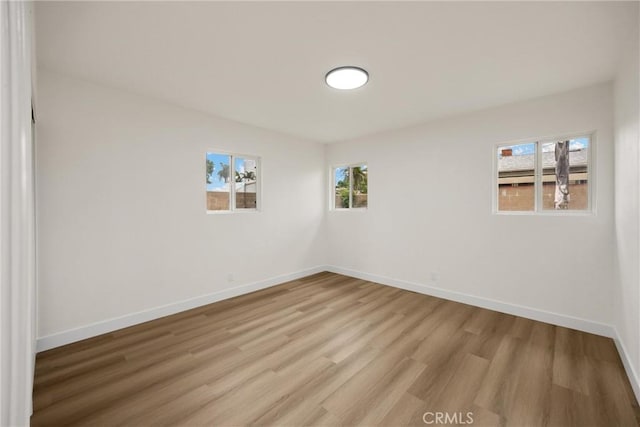9737 Felipe Ave, Montclair, CA 91763 - empty room featuring light wood-style floors and baseboards