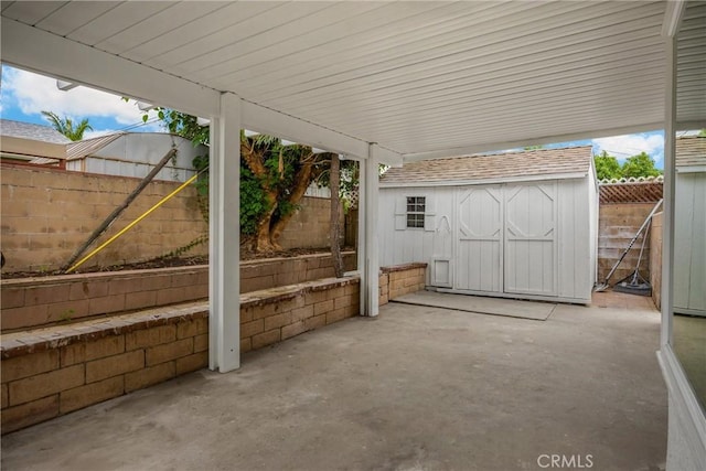 9737 Felipe Ave, Montclair, CA 91763 - fenced backyard with a patio area and a storage unit