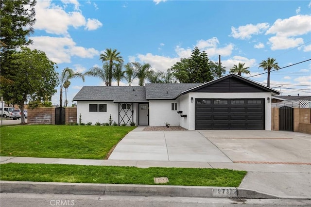 9737 Felipe Ave, Montclair, CA 91763 - single story home featuring stucco siding, a garage, driveway, and a gate