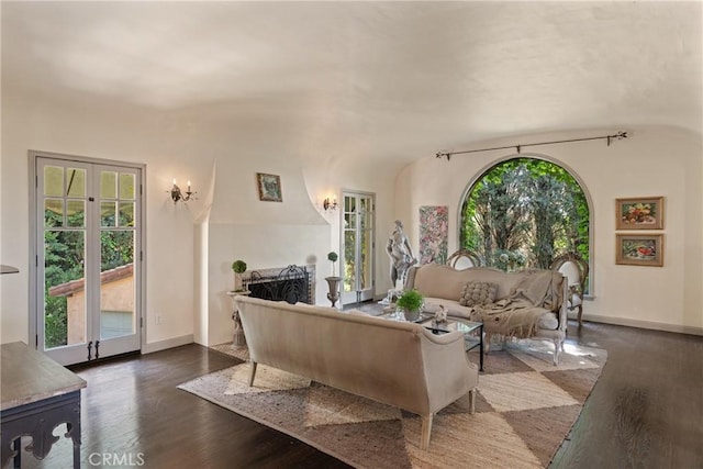 3492 Circle Rd, San Bernardino, CA 92405 - living area featuring dark wood finished floors and baseboards