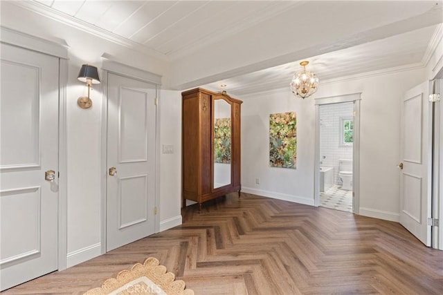 3492 Circle Rd, San Bernardino, CA 92405 - entryway featuring baseboards, crown molding, and a chandelier