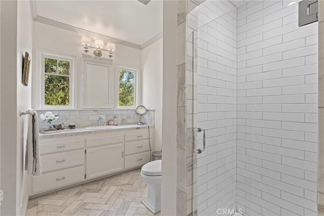 3492 Circle Rd, San Bernardino, CA 92405 - full bathroom with ornamental molding, a shower stall, vanity, and toilet