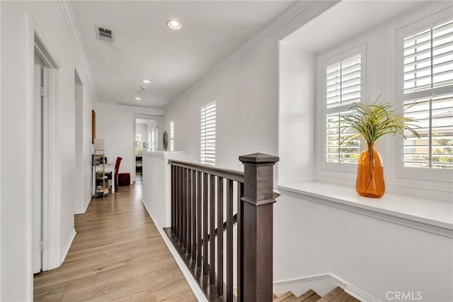 6038 Grace St, Chino, CA 91710 - hallway featuring an upstairs landing, ornamental molding, light wood-style floors, and recessed lighting