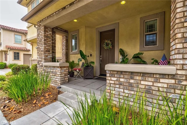 6038 Grace St, Chino, CA 91710 - entrance to property featuring covered porch and stucco siding