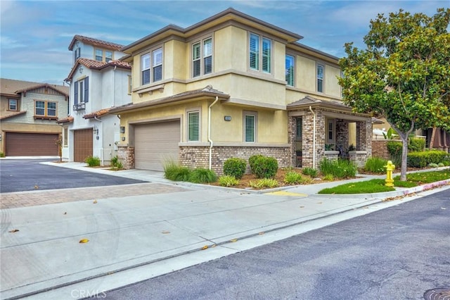 6038 Grace St, Chino, CA 91710 - multi unit property featuring stucco siding, an attached garage, and driveway