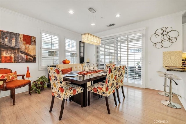 6038 Grace St, Chino, CA 91710 - dining space featuring healthy amount of natural light, ornamental molding, light wood-type flooring, baseboards, and recessed lighting
