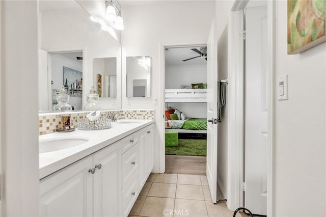 6038 Grace St, Chino, CA 91710 - full bath featuring ensuite bath, double vanity, tasteful backsplash, and tile patterned flooring