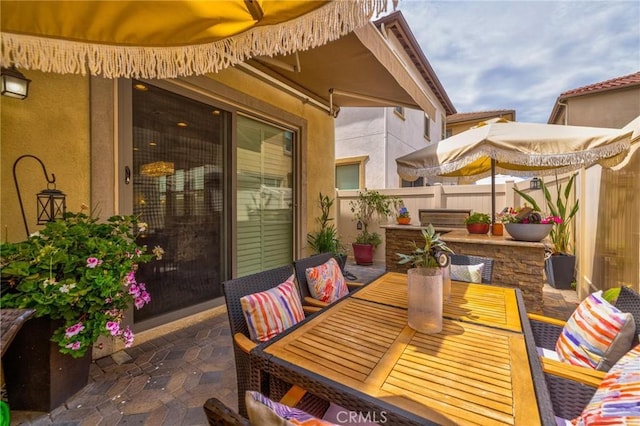 6038 Grace St, Chino, CA 91710 - fenced backyard with a patio area, outdoor dining area, and an outdoor kitchen