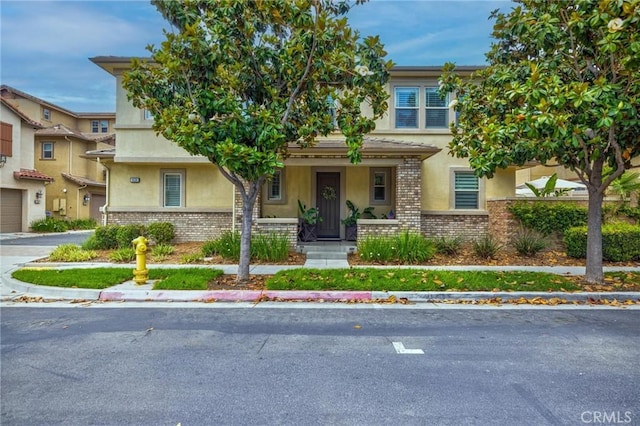 6038 Grace St, Chino, CA 91710 - view of property with stucco siding and brick siding