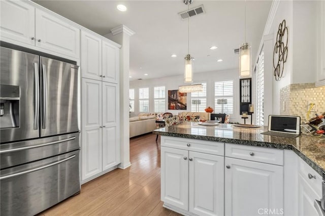6038 Grace St, Chino, CA 91710 - kitchen featuring stainless steel refrigerator with ice dispenser, a peninsula, white cabinetry, recessed lighting, and light wood finished floors