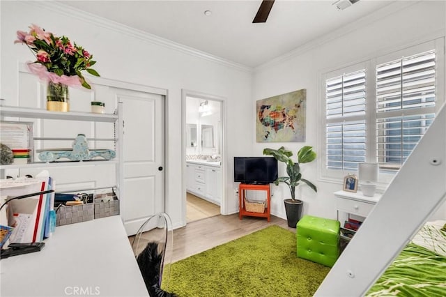 6038 Grace St, Chino, CA 91710 - office with light wood finished floors, crown molding, and a ceiling fan