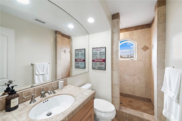 911 Buena Vis Unit 1, San Clemente, CA 92672 - bathroom featuring toilet, walk in shower, vanity, and recessed lighting