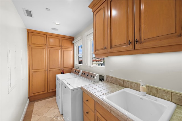 911 Buena Vis Unit 1, San Clemente, CA 92672 - laundry room with cabinet space, washer and clothes dryer, recessed lighting, and baseboards