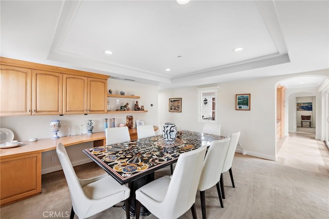 911 Buena Vis Unit 1, San Clemente, CA 92672 - dining area with a tray ceiling, arched walkways, recessed lighting, and light colored carpet