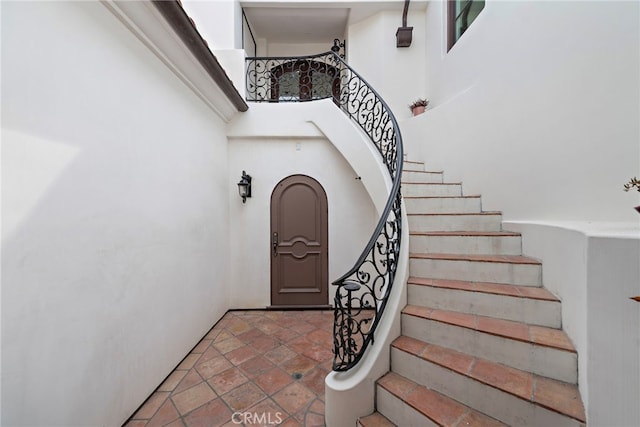 911 Buena Vis Unit 1, San Clemente, CA 92672 - stairs featuring a high ceiling