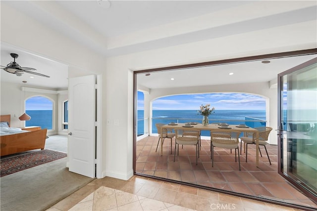 911 Buena Vis Unit 1, San Clemente, CA 92672 - dining room featuring recessed lighting, a water view, light tile patterned floors, a ceiling fan, and baseboards