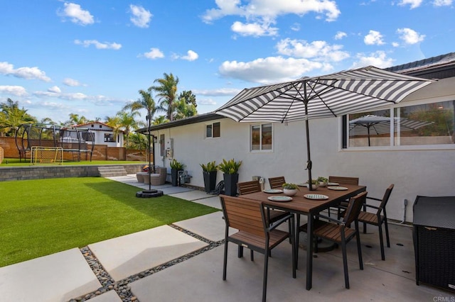 1368 Hymettus Ave, Encinitas, CA 92024 - view of patio featuring a trampoline and outdoor dining space