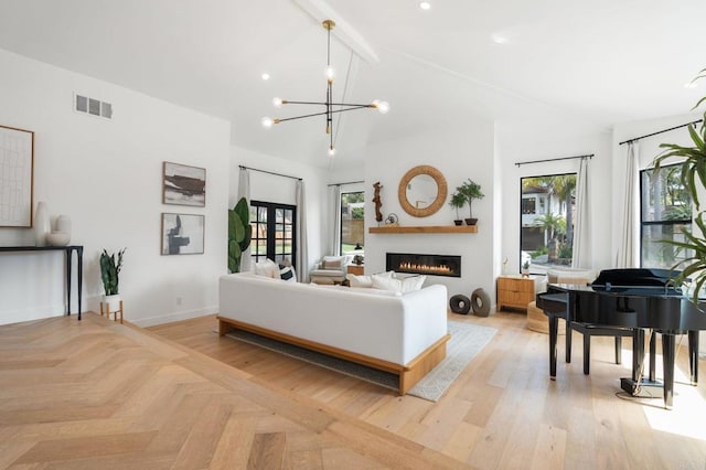 1368 Hymettus Ave, Encinitas, CA 92024 - living area with healthy amount of natural light, vaulted ceiling, a warm lit fireplace, a chandelier, and recessed lighting