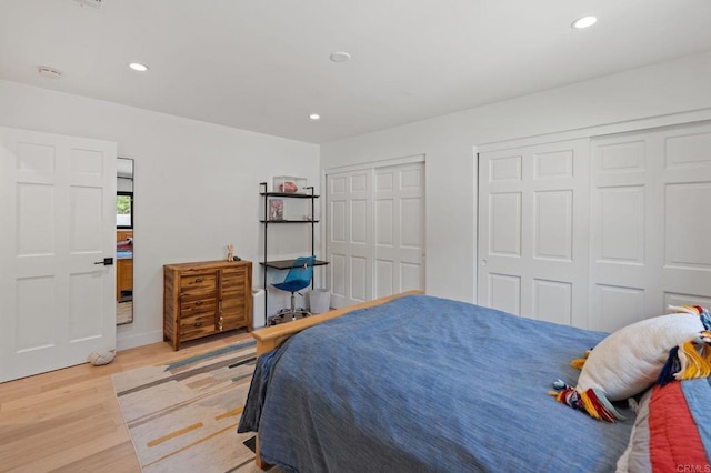1368 Hymettus Ave, Encinitas, CA 92024 - bedroom with multiple closets, wood finished floors, and recessed lighting