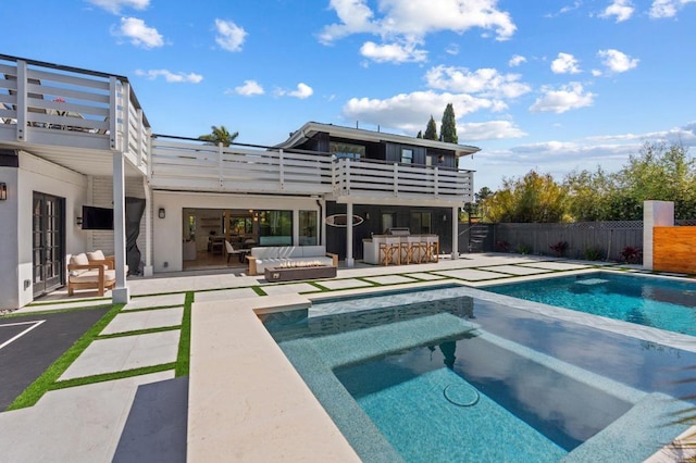 1368 Hymettus Ave, Encinitas, CA 92024 - back of house with a jacuzzi, an outdoor hangout area, a patio area, a balcony, and stucco siding