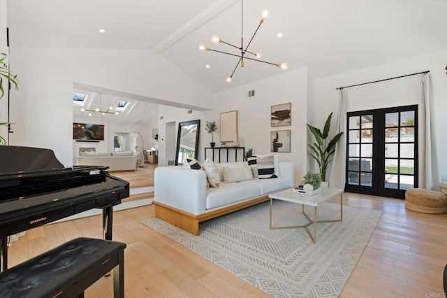 1368 Hymettus Ave, Encinitas, CA 92024 - living area featuring a chandelier, light wood-style floors, beamed ceiling, french doors, and high vaulted ceiling