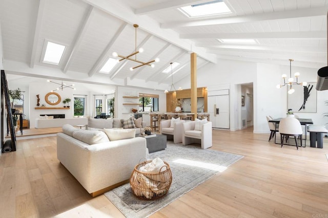 1368 Hymettus Ave, Encinitas, CA 92024 - living area featuring a chandelier and light wood finished floors