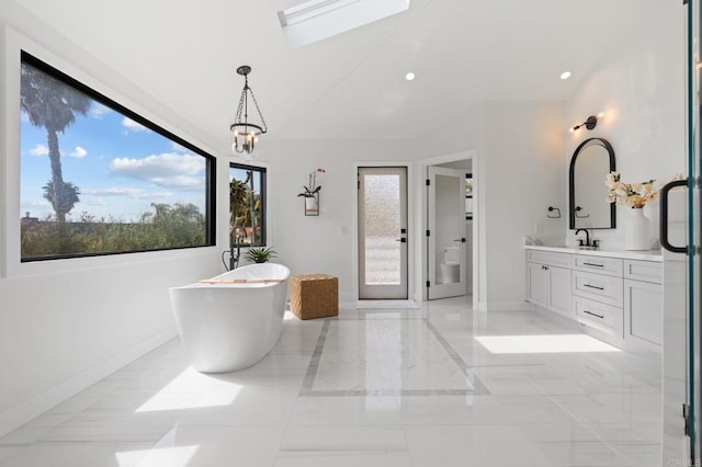 1368 Hymettus Ave, Encinitas, CA 92024 - bathroom featuring double vanity, a soaking tub, marble tiled flooring, and recessed lighting
