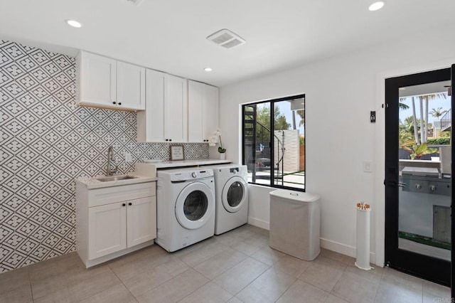 1368 Hymettus Ave, Encinitas, CA 92024 - laundry area with washer and dryer and recessed lighting