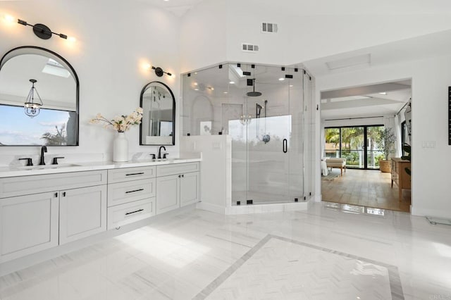 1368 Hymettus Ave, Encinitas, CA 92024 - bathroom with a shower stall, double vanity, and marble finish floors