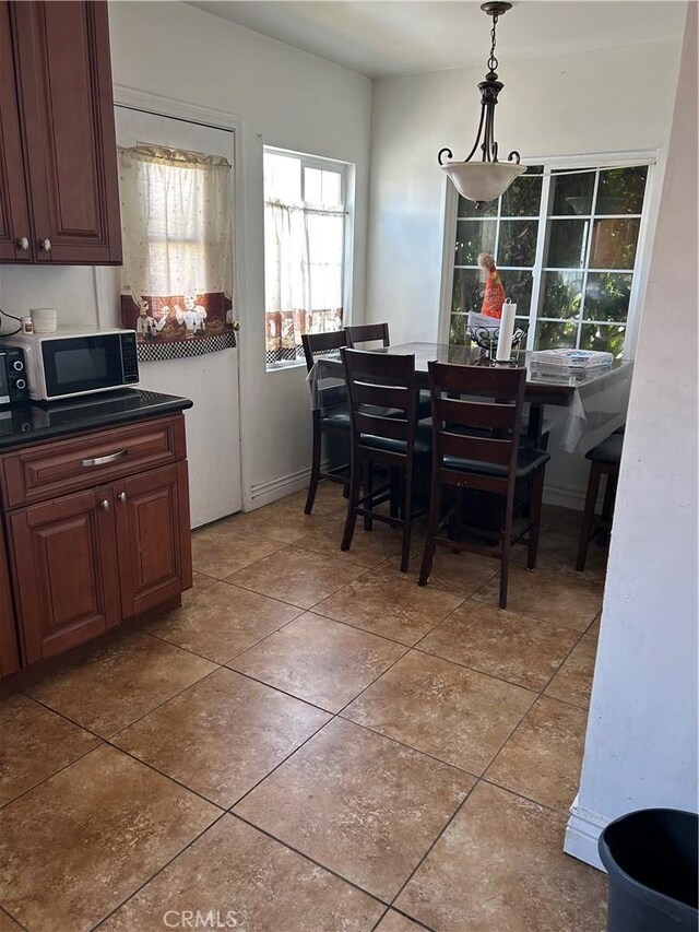 2650 E Jefferson St, Carson, CA 90810 - dining area featuring light tile patterned floors