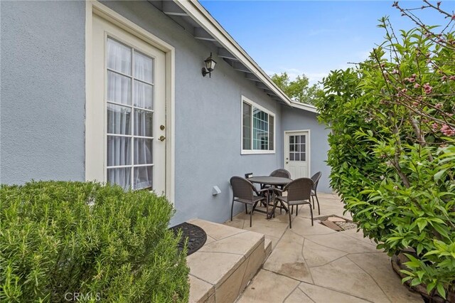 16900 Mayall St, North Hills, CA 91343 - view of patio featuring outdoor dining space