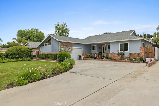16900 Mayall St, North Hills, CA 91343 - ranch-style house with an attached garage, driveway, a front yard, and a gate