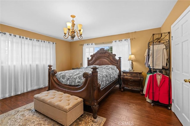 16900 Mayall St, North Hills, CA 91343 - bedroom with a chandelier and hardwood / wood-style floors