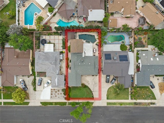 16900 Mayall St, North Hills, CA 91343 - aerial perspective of suburban area featuring a pool and property parcel outlined