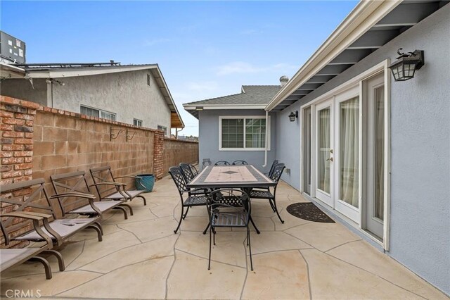 16900 Mayall St, North Hills, CA 91343 - view of patio / terrace with outdoor dining area and french doors