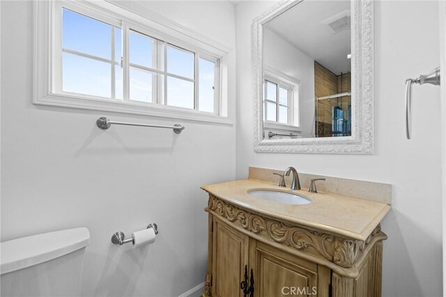 16900 Mayall St, North Hills, CA 91343 - full bath with toilet, vanity, and tiled shower